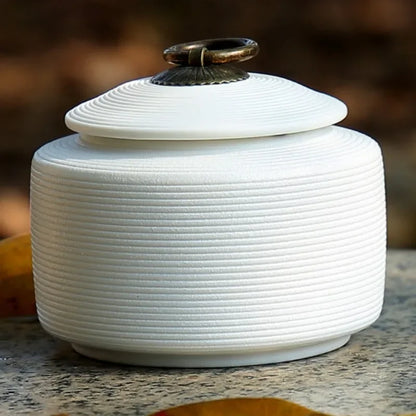 Minimal Style Keepsake Urn in ceramic finish, minimalist design, angled side view