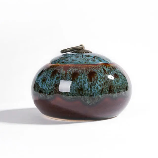 Handcrafted Frost Glaze Keepsake Urn in ceramic finish, frost glaze design, display setting